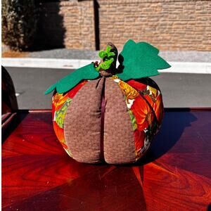 Vintage handmade fabric pumpkin decoration autumn-themed green leaves brown stem